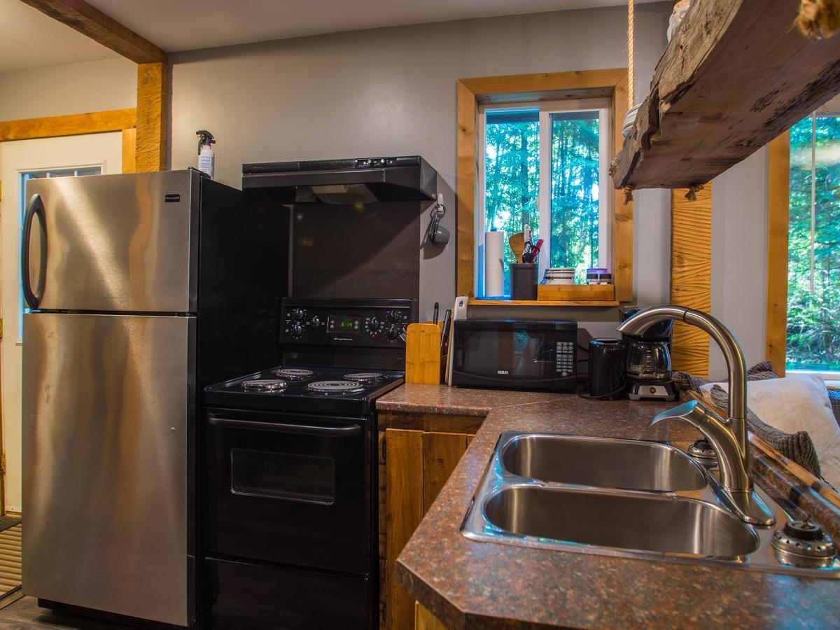 Surfs Inn Rainforest Cottages Юклулет Экстерьер фото